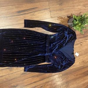 Sparkly blue long sleeve mini dress.